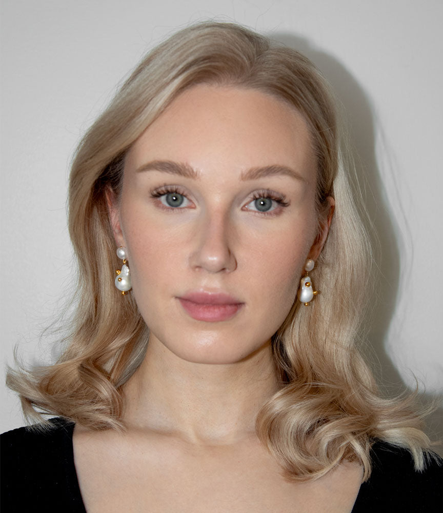 Helmia orbita stud earrings in gold